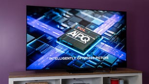 A TCL QM8 TV showing a scene from the film Mamma Mia